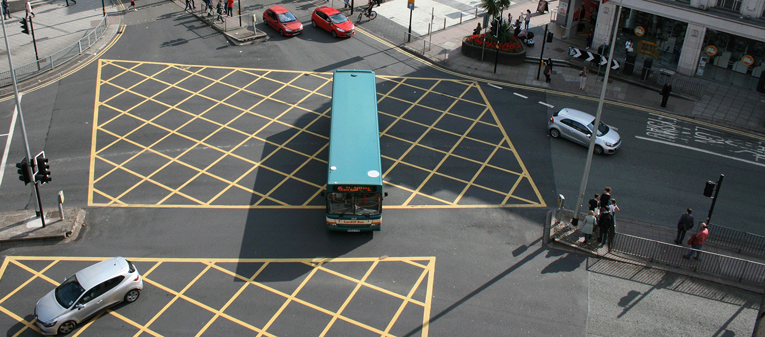 Aerial photo of a yellow box junction and bus in Cardiff city centre